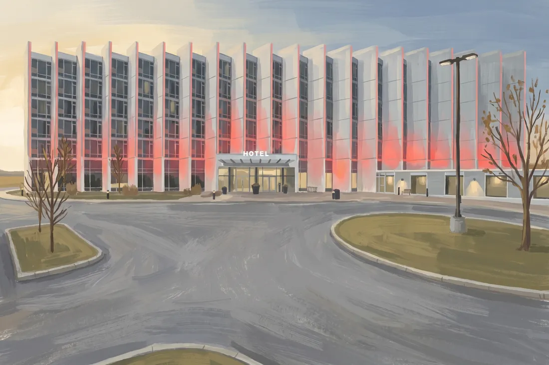 Grey Eagle Resort hotel and driveway at sunrise